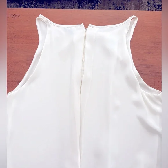 Sleeveless white blouse.  Chiffon Layered bottom and longer back. Large - Picture 7 of 13